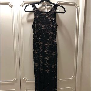 Black lace dress w/ nude underlining & front slit
